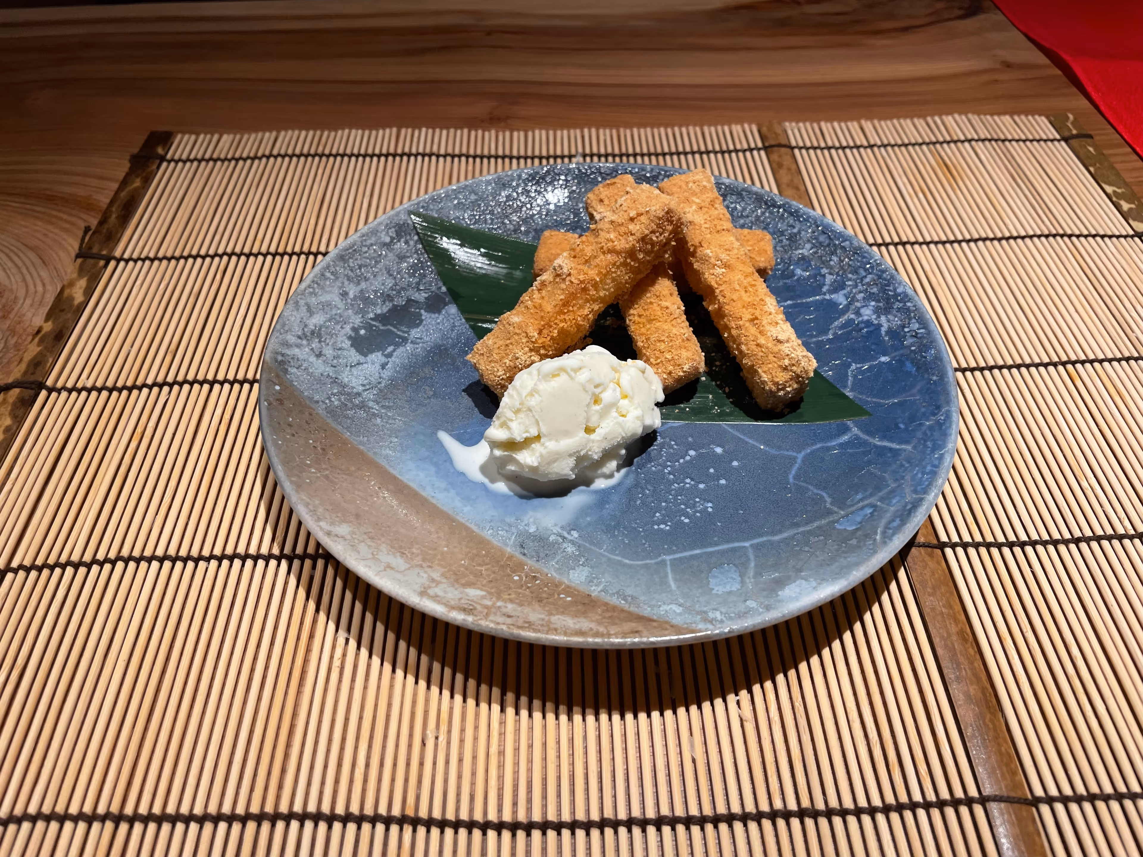 Japanese yam churros with vanilla ice cream at Uchisurube